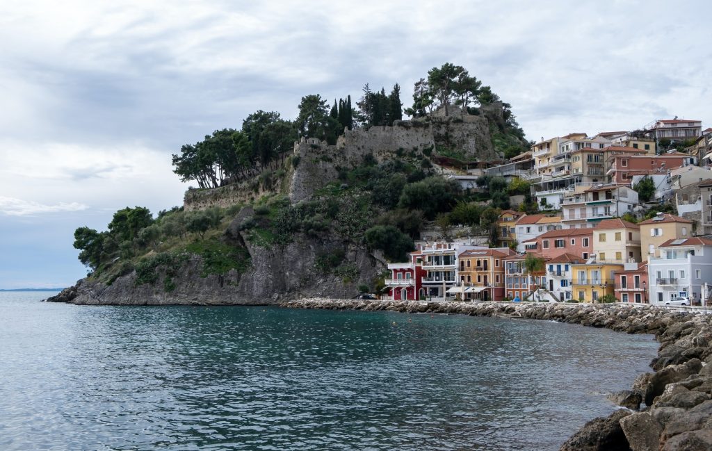 Parga, Greece. Traditional Ionian coast city colorful facade buildings and the Venetian Castle
